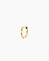 Single 18k gold huggie earring from the jewelry brand Gorjana.