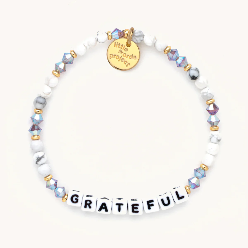 Bead bracelet from Little Words Project that reads, "Grateful."