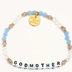 Bead bracelet in color gold from Little Words Project that reads, "Godmother".