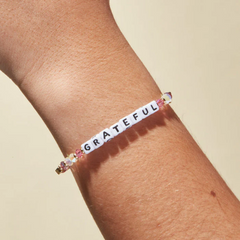 Bead bracelet by Little Words Project that reads, "GRATEFUL."