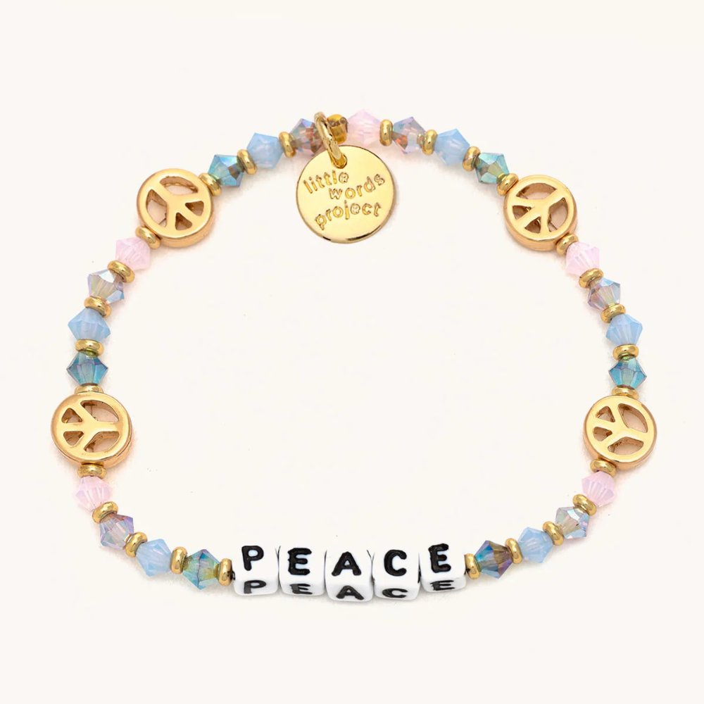 Bead bracelet Lucky Symbols Little Words Project that reads, "PEACE."