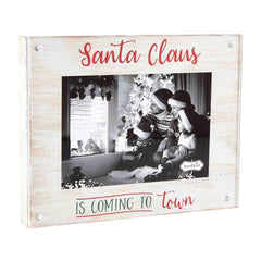 A magnetic picture frame from Mud Pie, that reads "Santa Claus Is Coming To Town."