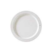 A white round serving platter from Nora Fleming in the color white, with a slot for a Nora Fleming mini.