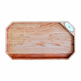 A limited edition Nora Fleming Octagonal Wood Board, with a slot to hold a Nora Fleming Mini.