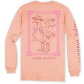 A peach colored long sleeve t-shirt showing a goose in cowboy boots, and cowboy hat, with a pink red ribbon around its neck. The phrase, "Silly Goose" is just too the right of the goose. A pink frame is around the goose. The Simply Southern Brand logo is at the bottom of the shirt, and on the right sleeve.
