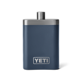 A navy blue flask with a silver top, and silver YETI logo on the front.