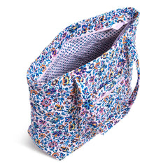 The main pocket of a Vera Tote Bag In Cloud Vine Multi pattern, unzipped displaying the interior design of the tote bag.