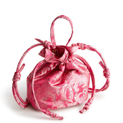 Tilden Drawstring Crossbody in the pattern Positively Pink.