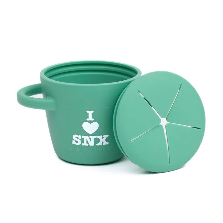 Happy Snacker in the color green that reads, "I <3 SNX" with the Bella Tunno logo below it.