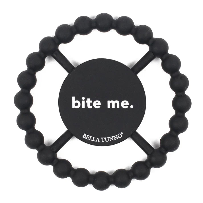 Black color Happy Teether that reads, "bite me" in the middle. The teether is made from silicone, and comes from the brand Bella Tunno.