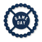 BLUE color Happy Teether that reads, "GAME DAY" in the middle. The teether is made from silicone, and comes from the brand Bella Tunno.