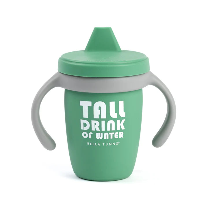 A green color sippy cup, with gray handles. The sippy cup reads, "Tall Drink of Water" with the Bella Tunno logo at the bottom.