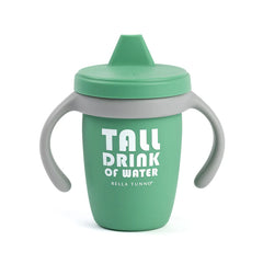 A green color sippy cup, with gray handles. The sippy cup reads, "Tall Drink of Water" with the Bella Tunno logo at the bottom.