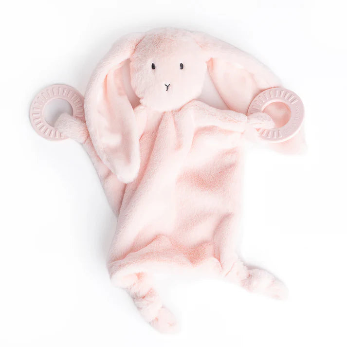 A pink bunny teether, with two teething rings on it's paws. The bunnies name is Betty, and comes from the brand Bella Tunno.