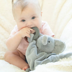 A grey elephant teether, with two teething rings on it's paws. The bunnies name is Evie, and comes from the brand Bella Tunno.