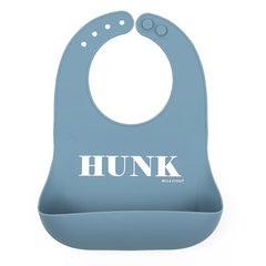 Blue color Wonder Bib that reads, "HUNK" with the Bella Tunno logo below it. The bib is adjustable in size with 4 snaps that easily fit around the neck. The Wonder Bib is designed out of silicone, and is made by Bella Tunno.