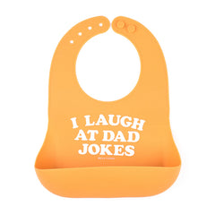 Orange color Wonder Bib that reads, "I Laugh A Dad Jokes" with the Bella Tunno logo below it. The bib is adjustable in size with 4 snaps that easily fit around the neck. The Wonder Bib is designed out of silicone, and is made by Bella Tunno.