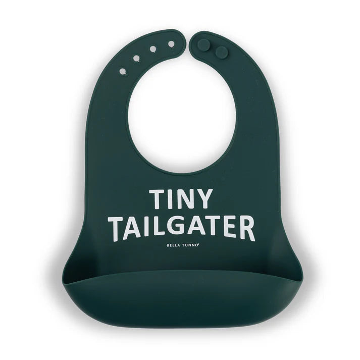 Green color Wonder Bib that reads, "Tiny Tailgater" with the Bella Tunno logo below it. The bib is adjustable in size with 4 snaps that easily fit around the neck. The Wonder Bib is designed out of silicone, and is made by Bella Tunno.