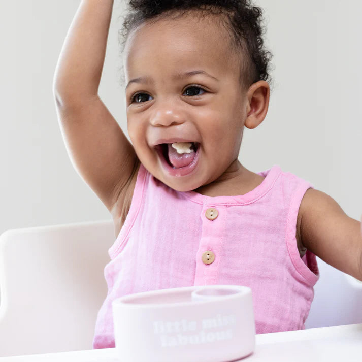 A Bella Tunno Wonder Bowl for kids in the color pink that reads, "little miss fabulous." 