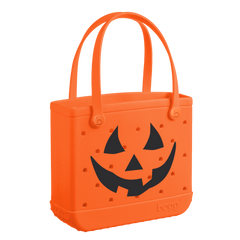 Limited edition halloween themed Baby Bogg bag. The color orange with a smiling Halloween pumpkin.