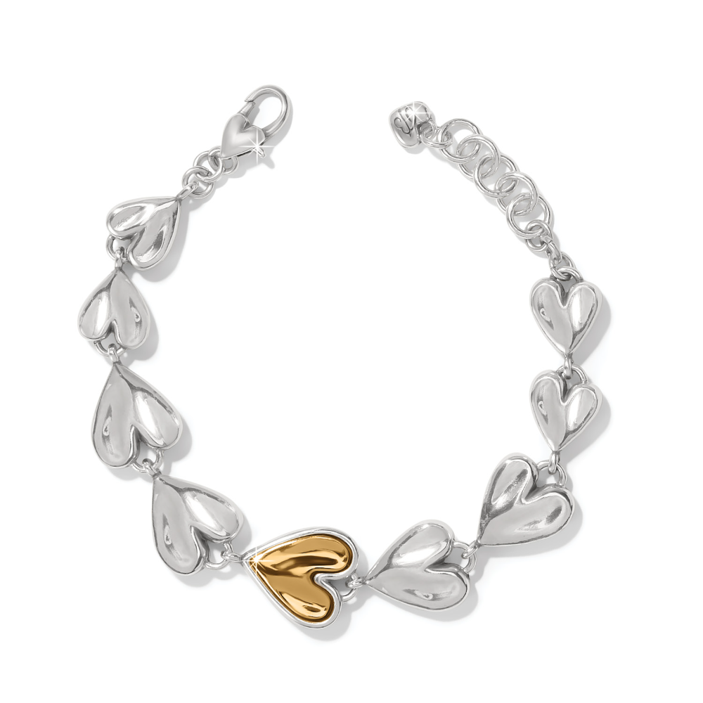 Silver Brighton bracelet with one gold heart.