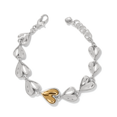 Silver Brighton bracelet with one gold heart.