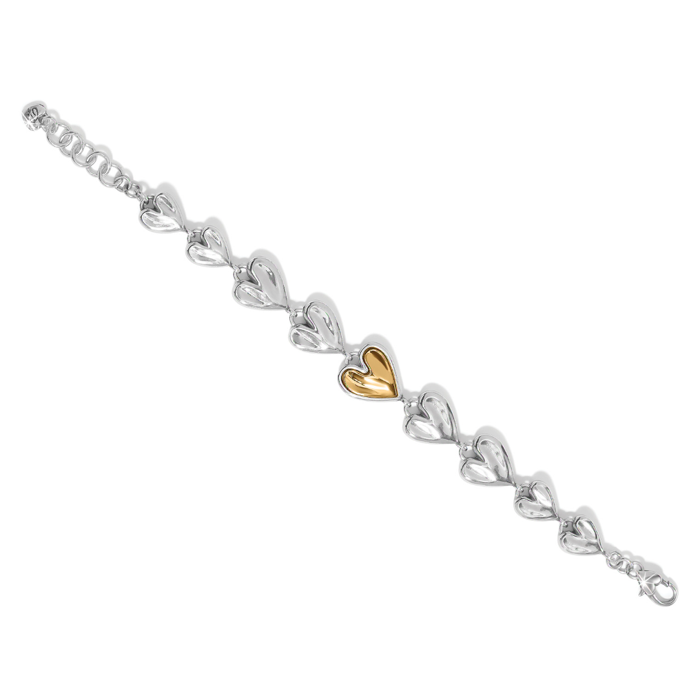 Silver Brighton bracelet with one gold heart.