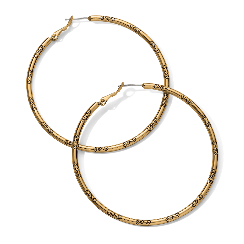 Grande Hoop Charm Earrings from Brighton Designs. The earrings are the color gold, and feature a black symbol all around them.