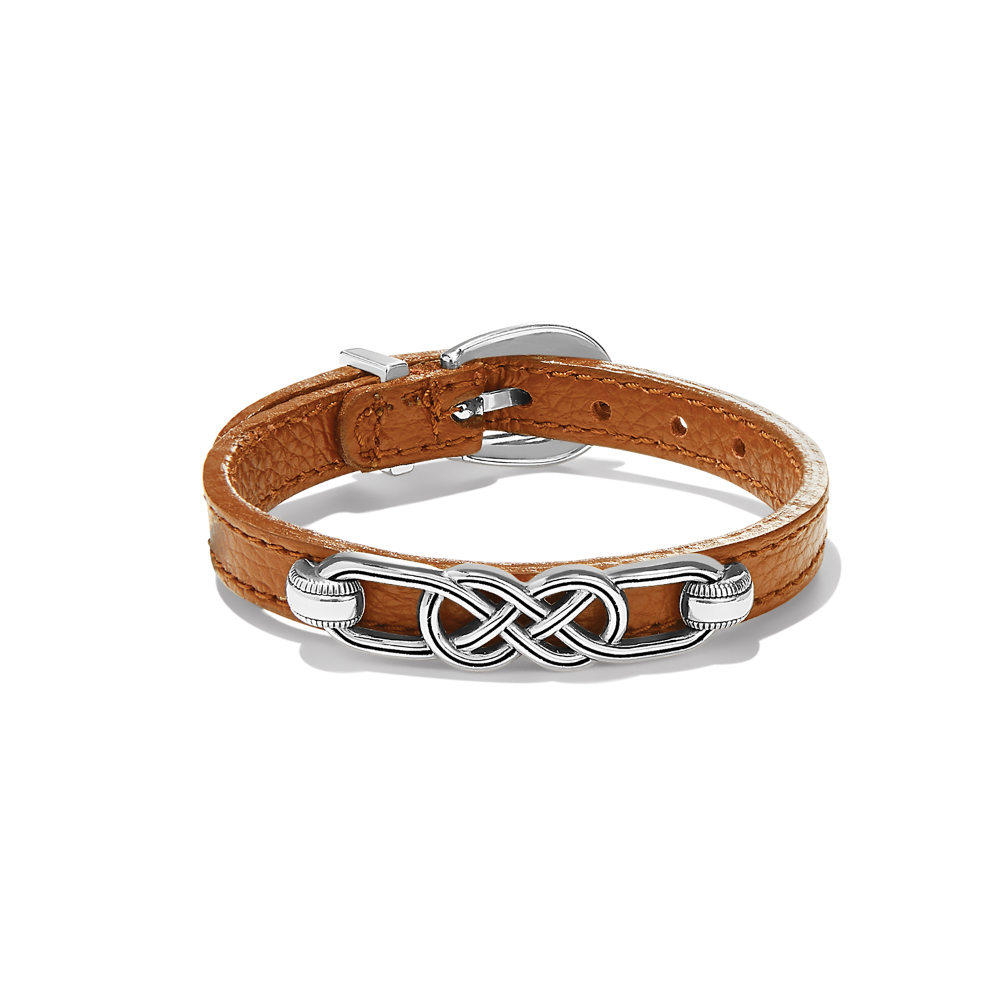 A brown leather buckle bracelet with silver plated finish.