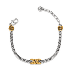 A silver chain bracelet with gold interlok twists.