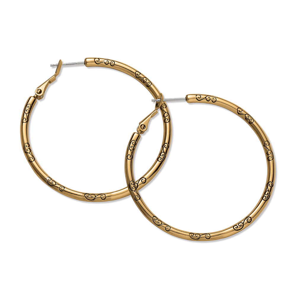 Large hoop earrings in the color gold, with black symbols all around them. From Brighton Designs.