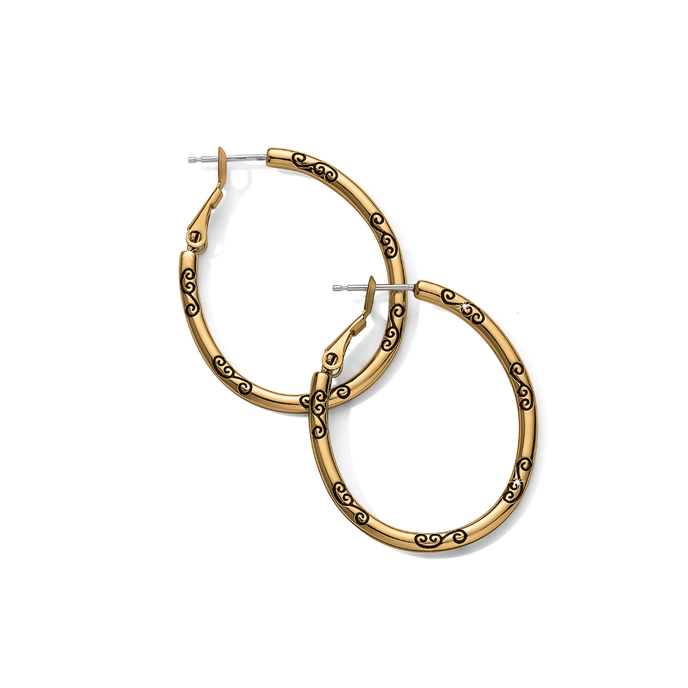 Gold earrings from Brighton Designs. The earrings feature a black symbol all around them.