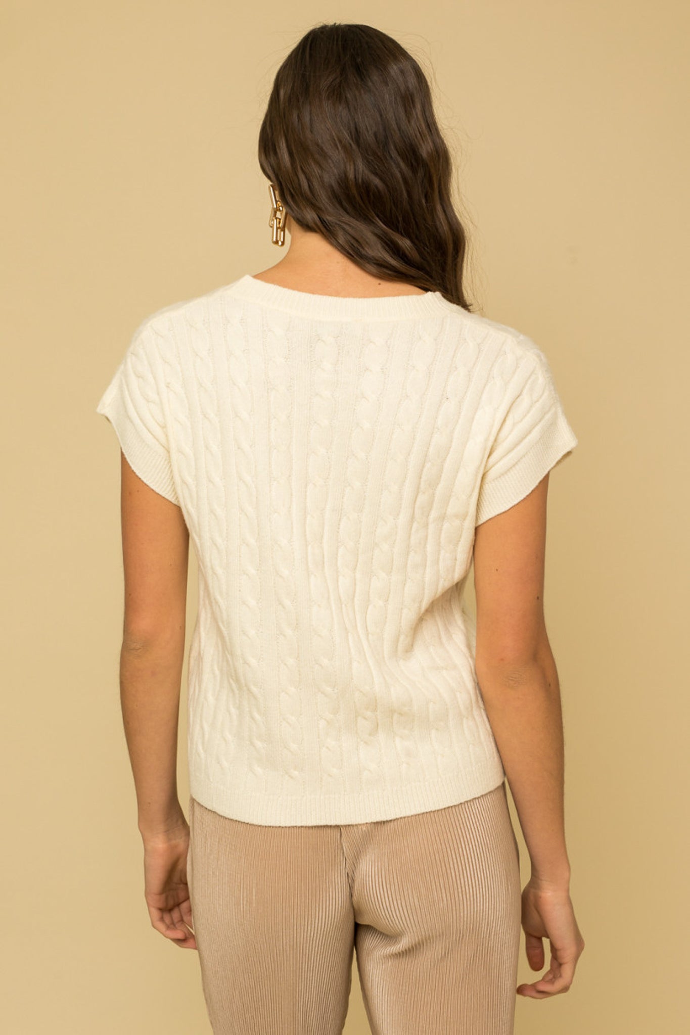 Cable Knit Short Sleeve Sweater in the color white.