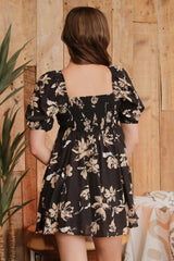 Black dress with floral patterns.