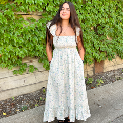 A full front view of a Floral Midi Dress from Daisy Mercantile.