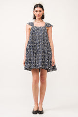 Minos Mini Dress with a floral pattern, the dress is sleeveless.