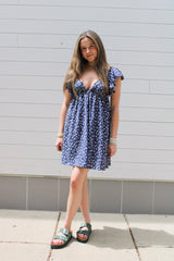 A blue colored mini dress with short sleeves from Daisy Mercantile.