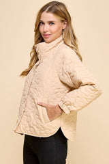 Beige color jacket that buttons up all the way up to the neck, with flower print etched into the jacket.