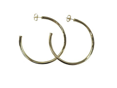 Everybody's Favorite Hoops 2.5" Earrings from Sheila Fajl in color shiny gold.