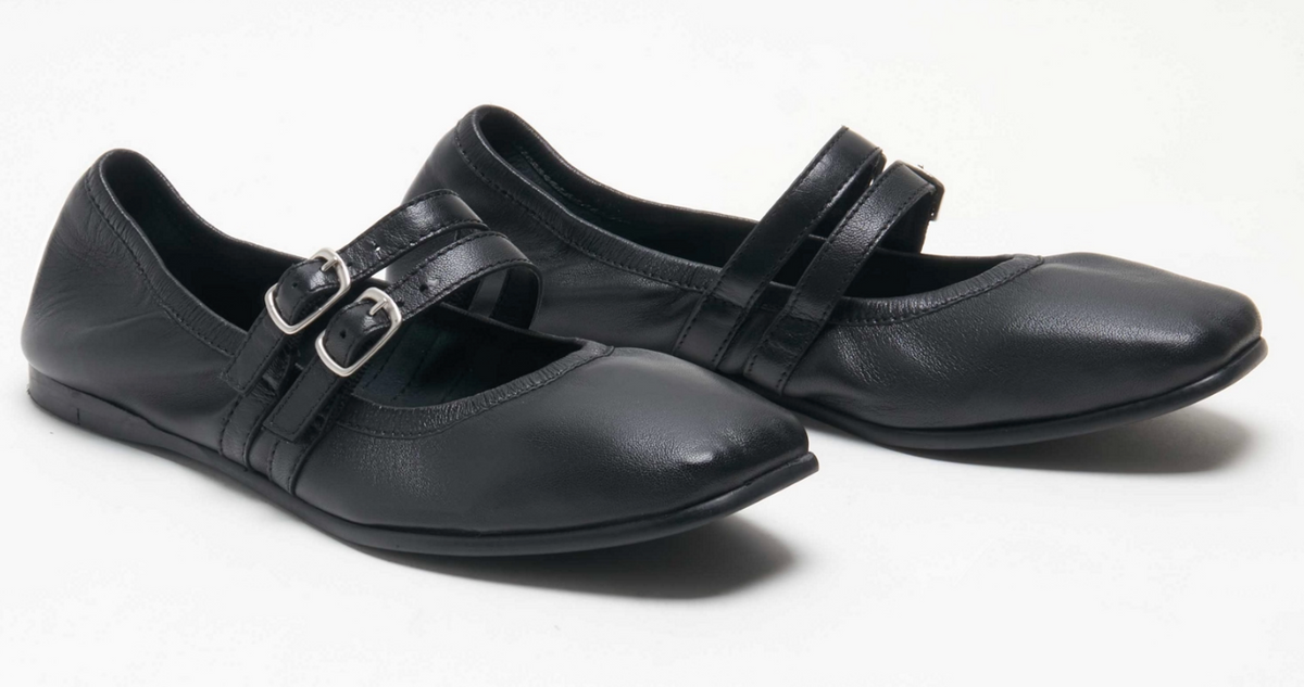 Free People Gemini ballet flats in the color black.