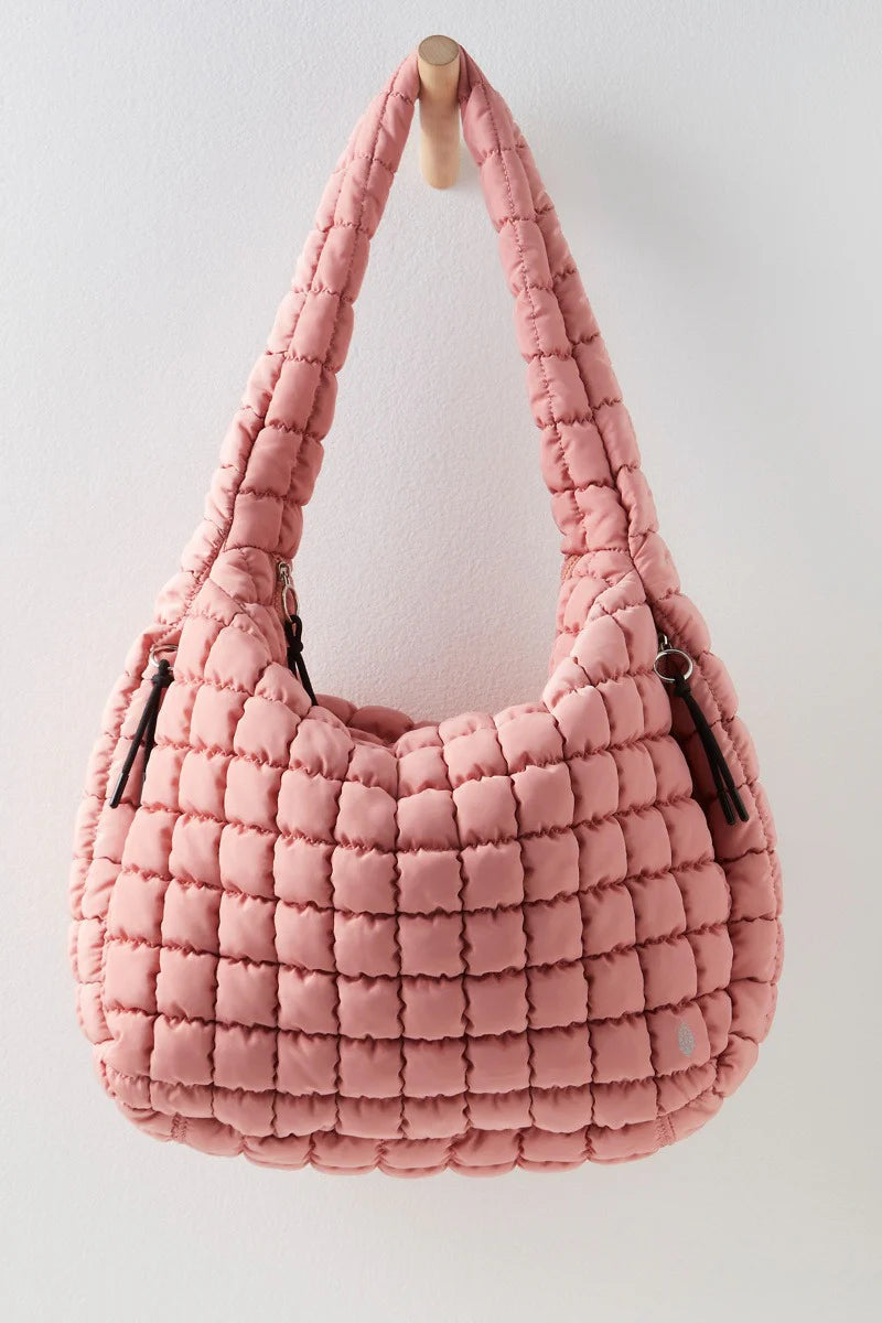 Free People Movement Quilted Carryall Bag in color pink.