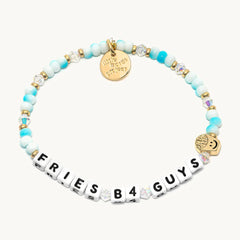 A blue and gold Little Words Project bracelet that reads, "Frieds b4 guys."