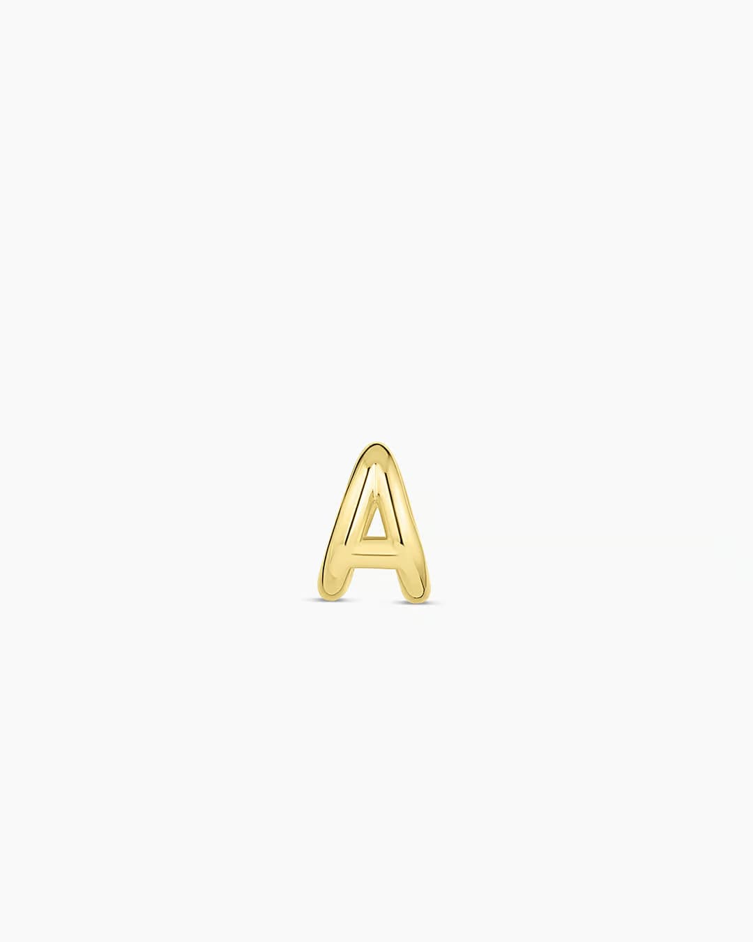 18k gold plated Initial A huggie earring from the jewelry brand Gorjana.