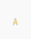 18k gold plated Initial A huggie earring from the jewelry brand Gorjana.