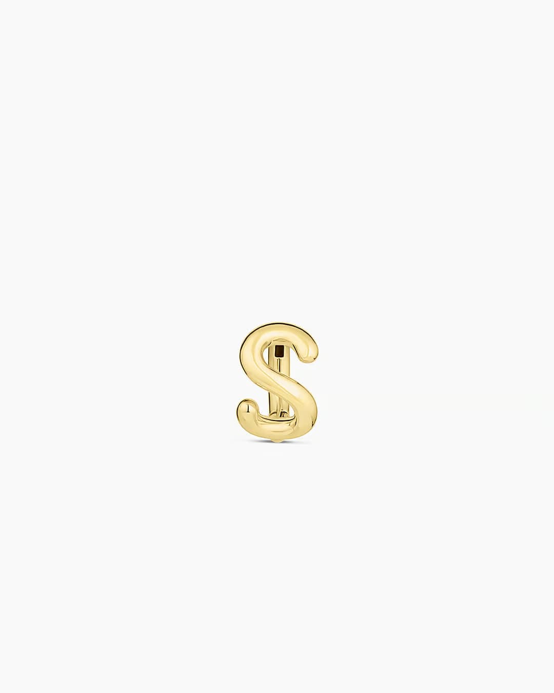 18k gold plated Initial S huggie earring from the jewelry brand Gorjana.
