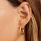 18 gold plated crew hoop earrings from the jewelry brand Gorjana.