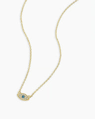 18k gold evil eye necklace from the brand Gorjana.