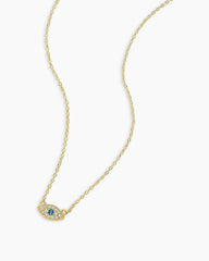 18k gold evil eye necklace from the brand Gorjana.