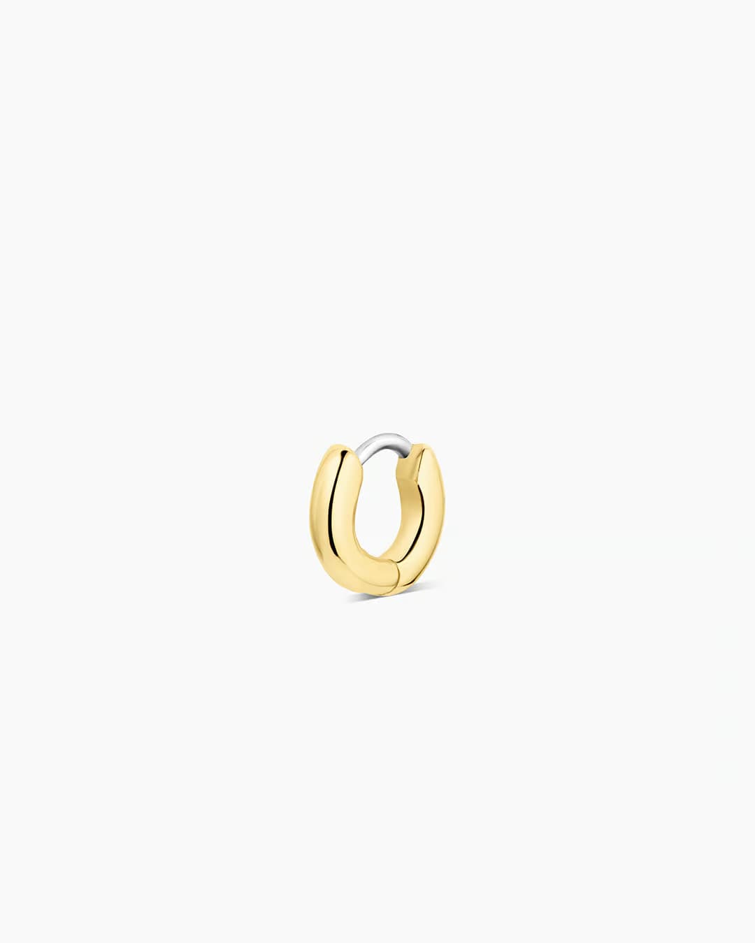 18k gold plated single huggie earring from the brand Gorjana.