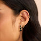 18k gold plated single huggie earring from the brand Gorjana.